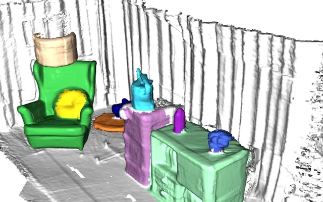 Instance-segmented 3D mesh of a room captured with Spot, each object in its own colour.